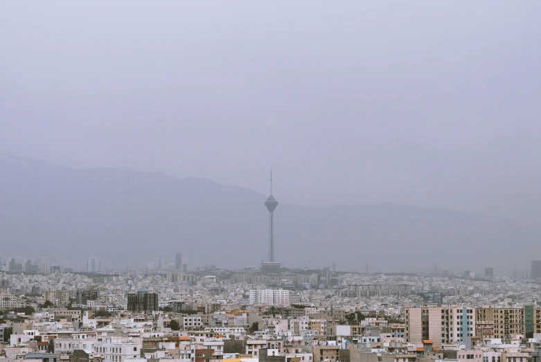 a view of city from a hill top