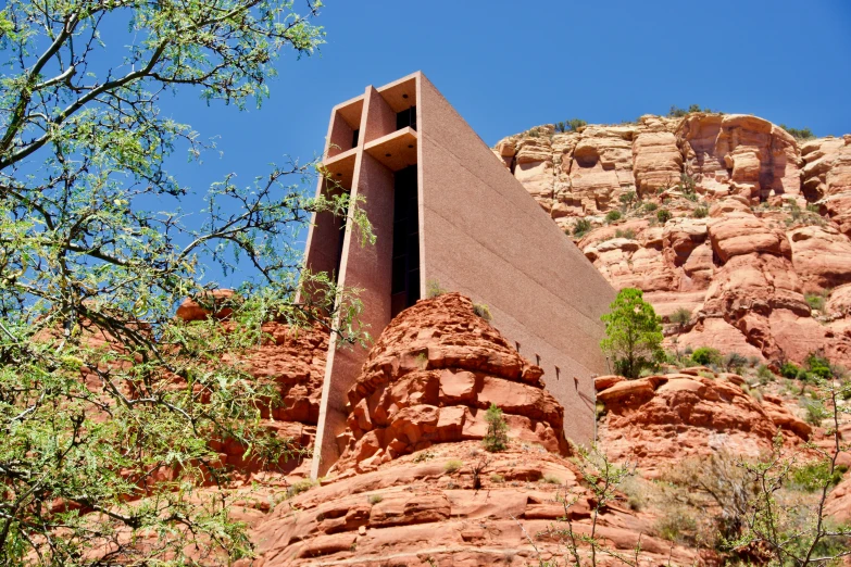 a stone structure built into the side of a mountain