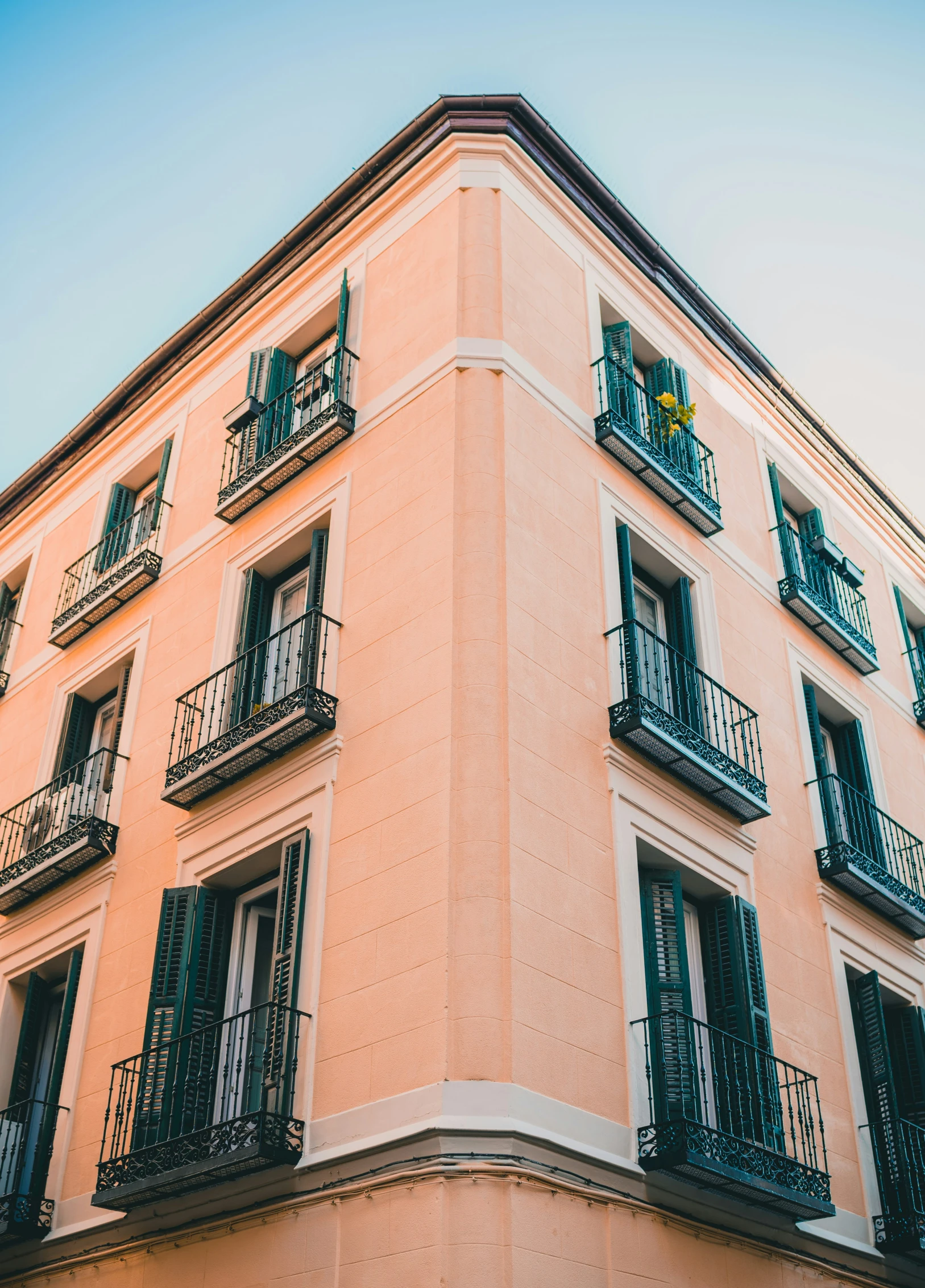 a building with multiple balconies on top