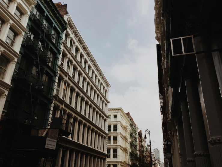 some very large buildings on the road side