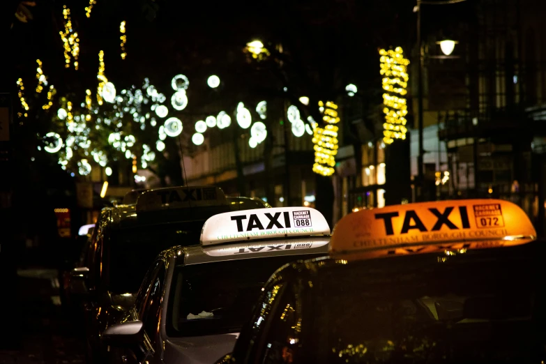 taxi cab in city street on a rainy night