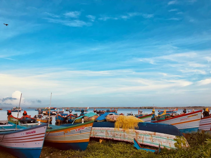 an image of several boats on the water