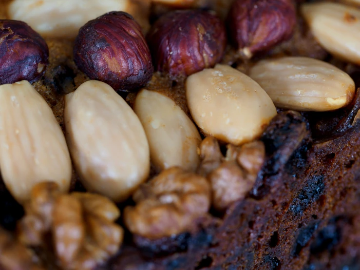 a cake with nuts on top of it