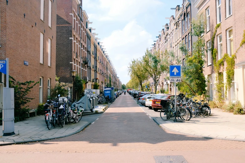 a few bikes parked next to a building with no people on them