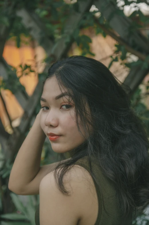 a close up of a woman with a long black hair