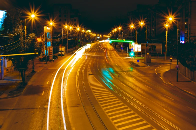 a highway intersection with lights and traffic