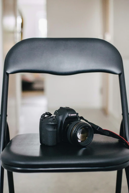 a chair has a camera on top of it