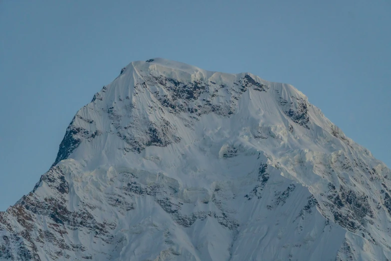 a large peak that is covered with snow