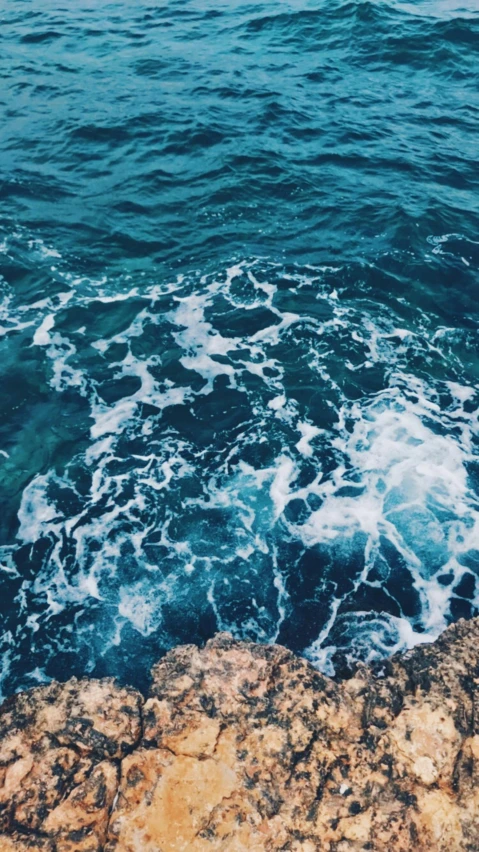 a view of the waves coming from the water