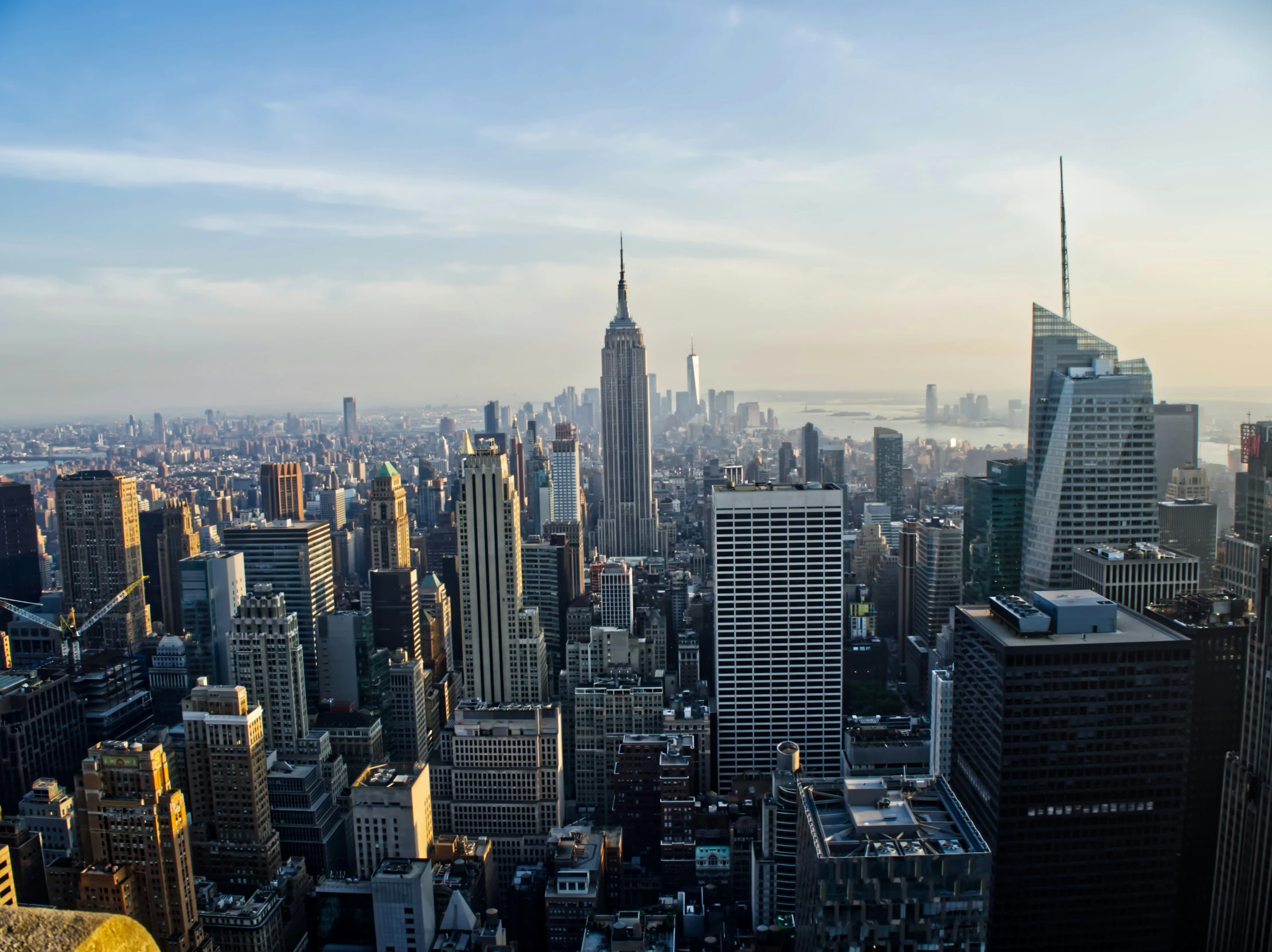 looking out at the big city skyline from top of the rock