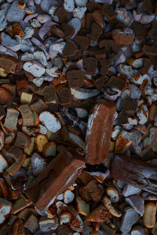 a closeup of stones and metal near one another