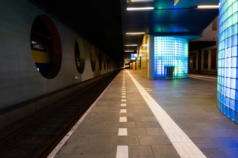 a train track with a few cars going by