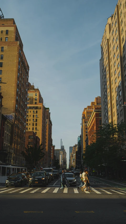 some tall buildings that are sitting in the street