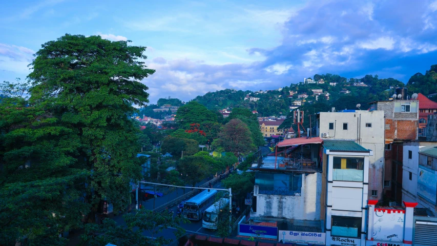 several houses on top of the hill at dusk