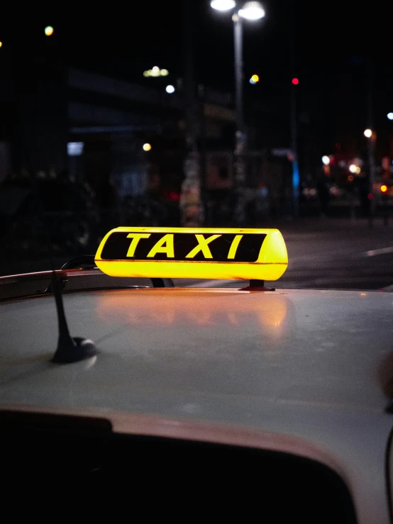 an image of the taxi sign from inside a car