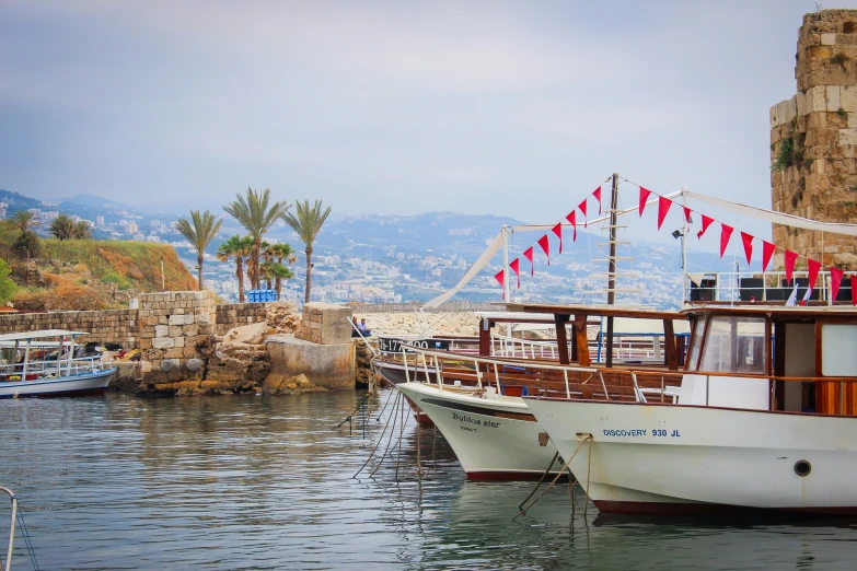 a couple of boats docked next to each other