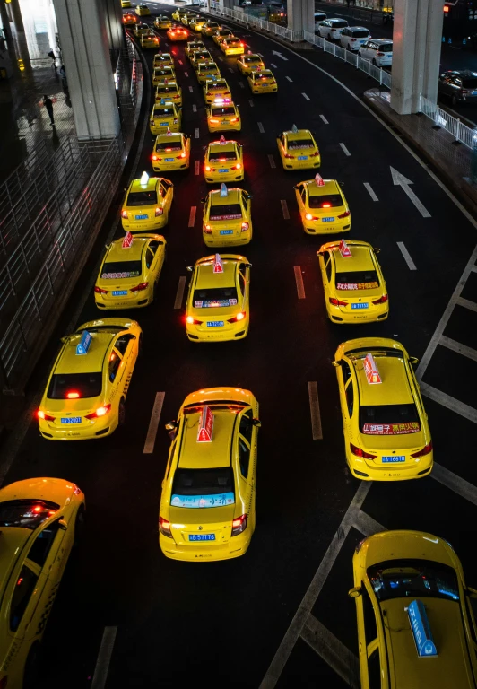 a lot of cars lined up in a row