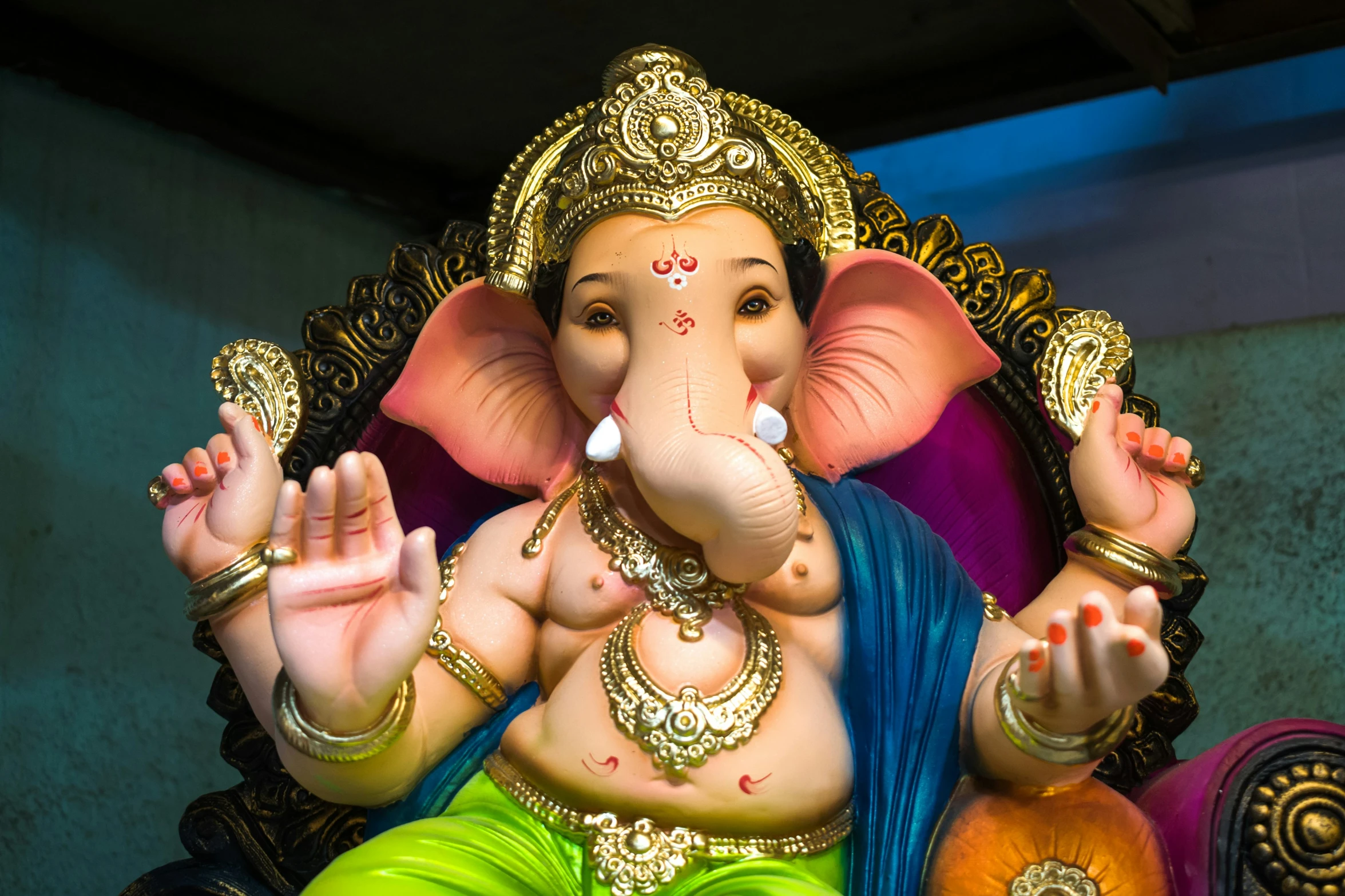 a statue of an elephant, dressed in indian costume