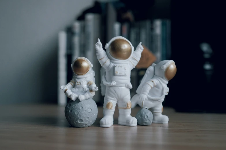 a bunch of small space related figurines