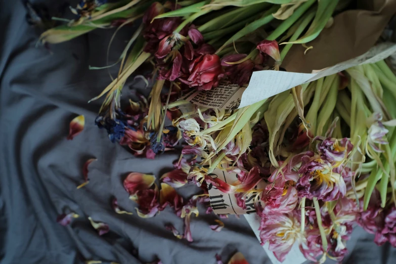 flowers sitting on top of each other on a sheet