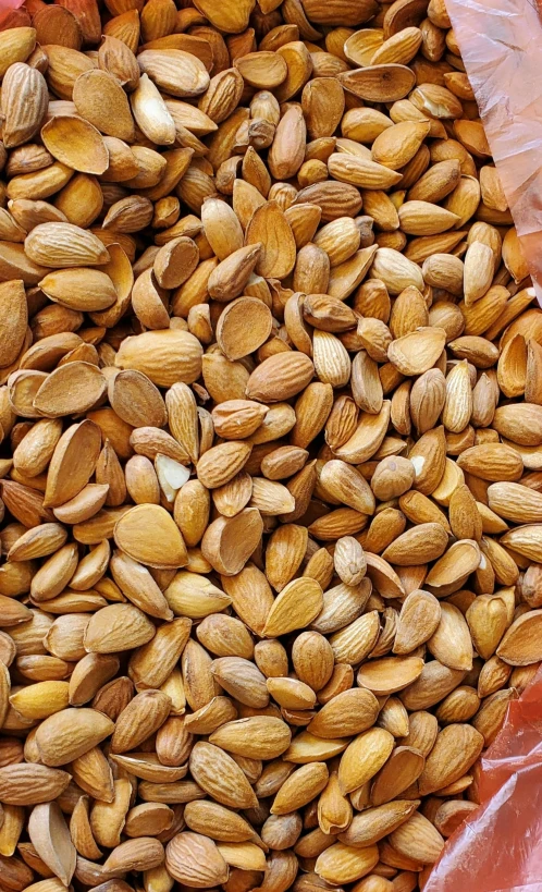 almonds in bag for sale in large grocery bags