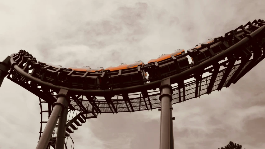 a roller coaster ride on a cloudy day