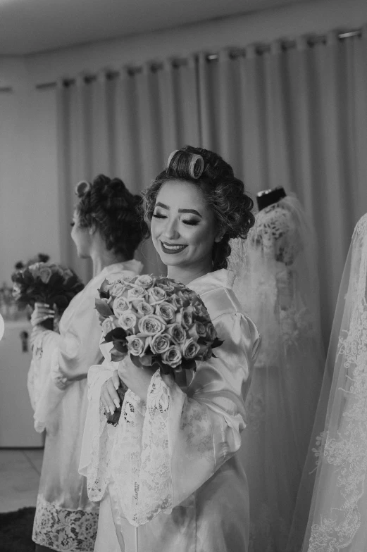 a bride and her bridalsm getting ready to go in