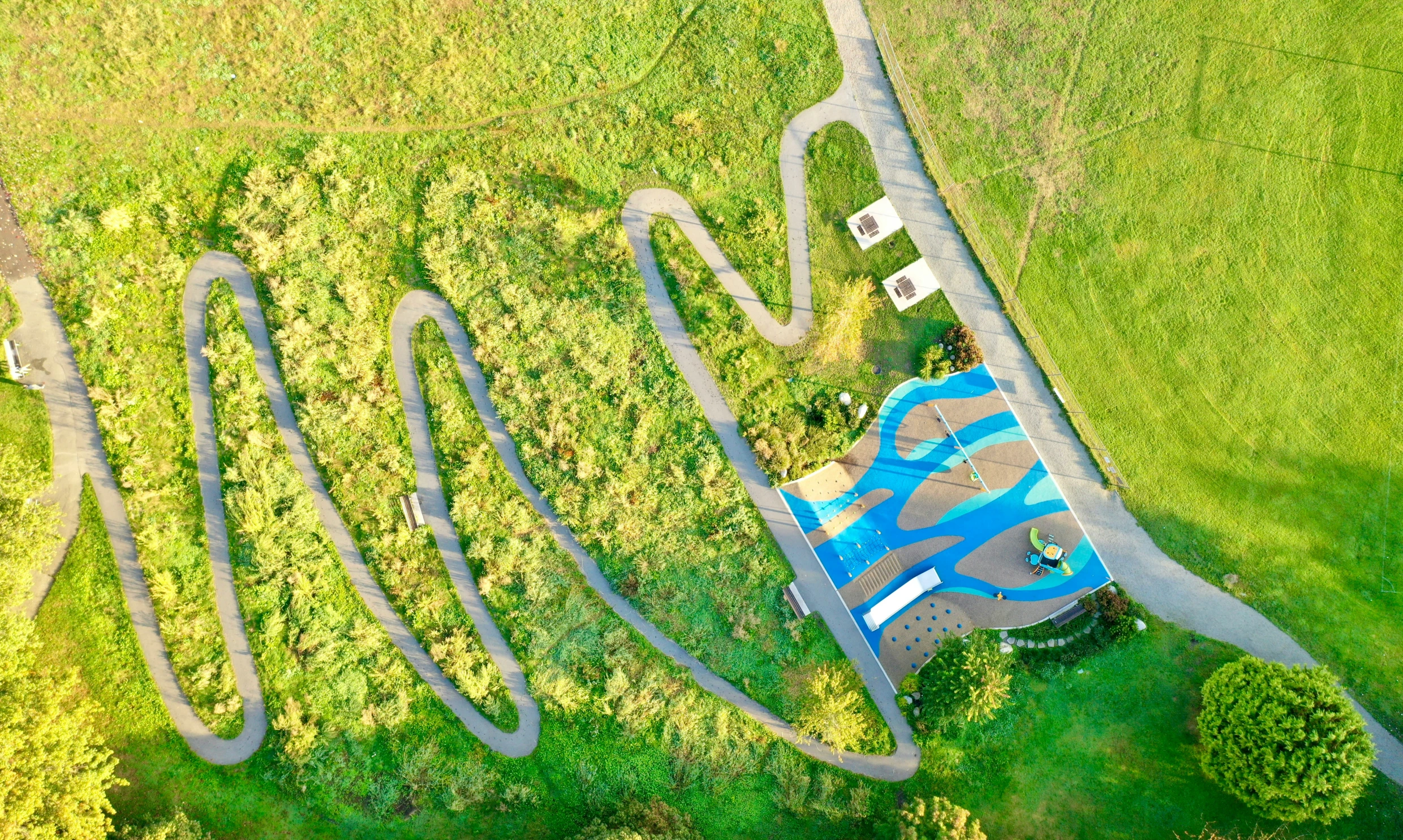 a bird's - eye s shows an aerial view of a pool in the yard