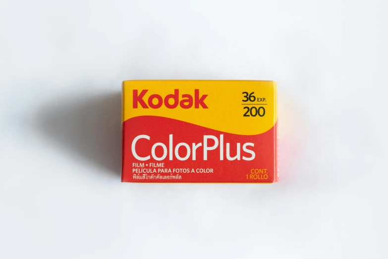 a yellow box of kodak colorsplus sitting on top of white background