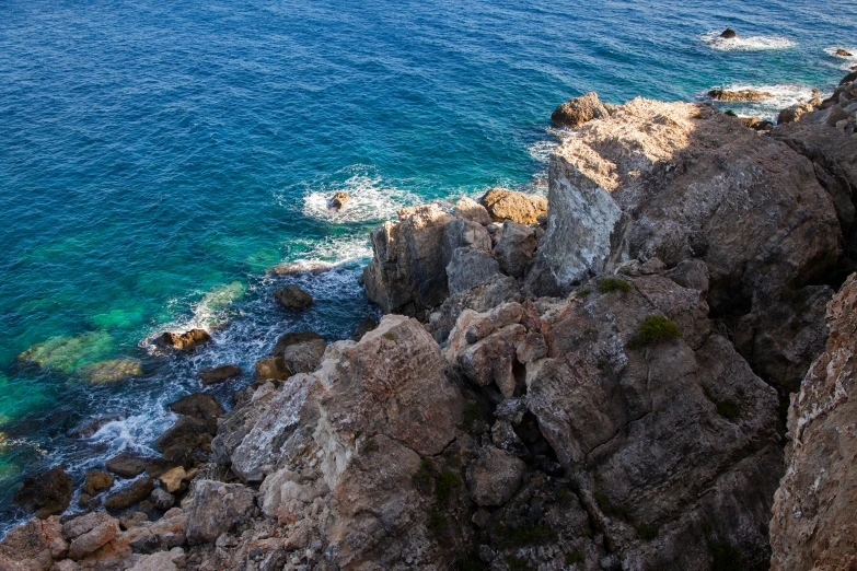 an aerial view of a beautiful blue ocean