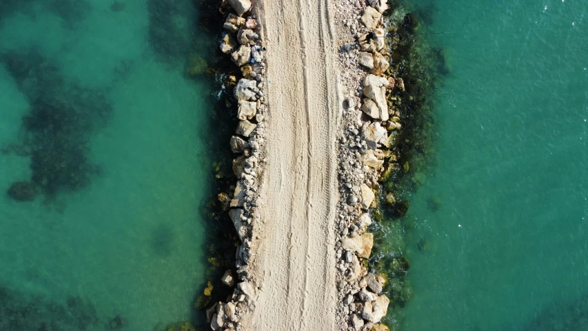 an aerial view of the beach on a sunny day