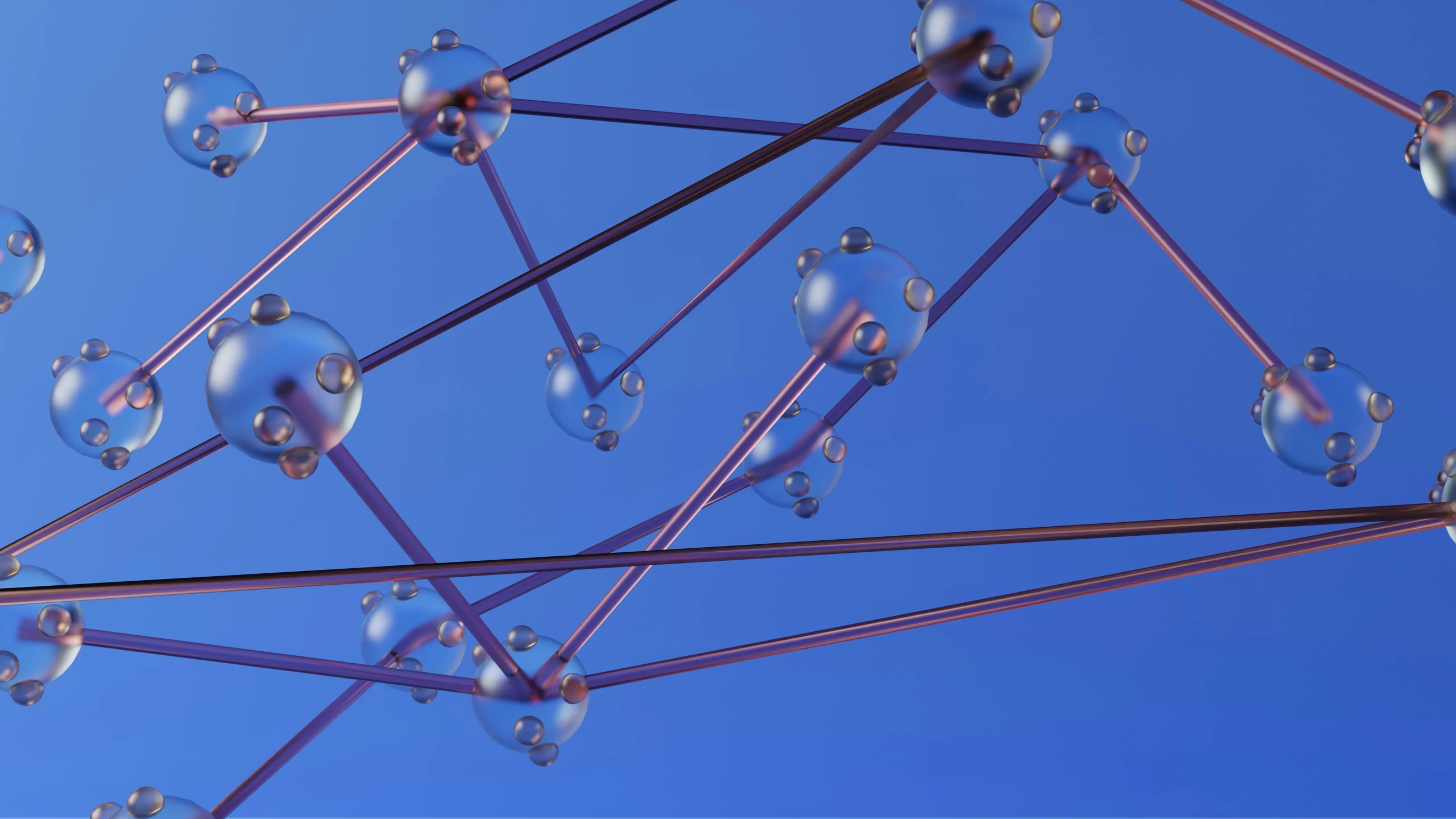 a group of clear balls are on top of purple wires