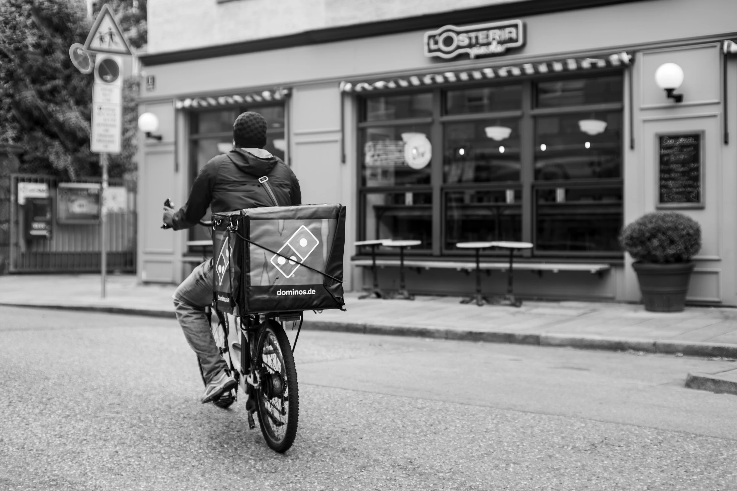 a person on a bicycle with a basket