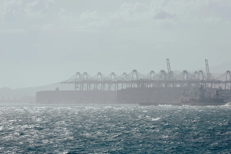 a large ship sailing in the middle of a body of water