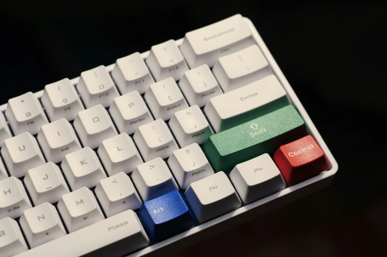 a white keyboard with a colorful keyboard on