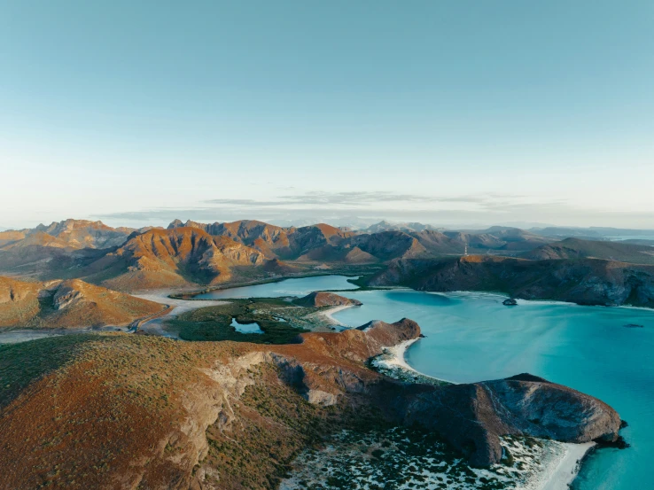 the landscape shows an empty island and blue waters