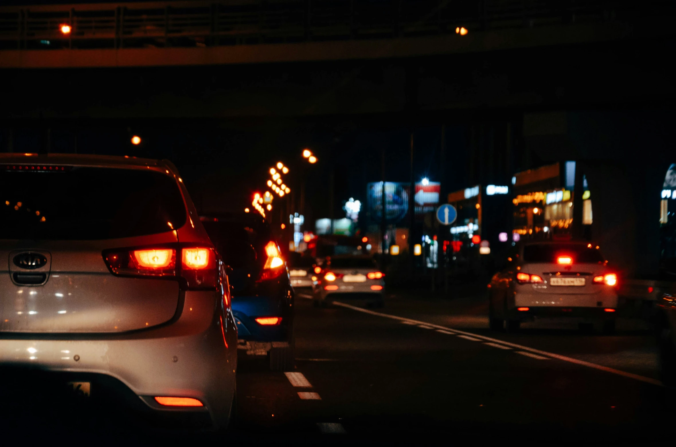 the cars are in the traffic lane on the street