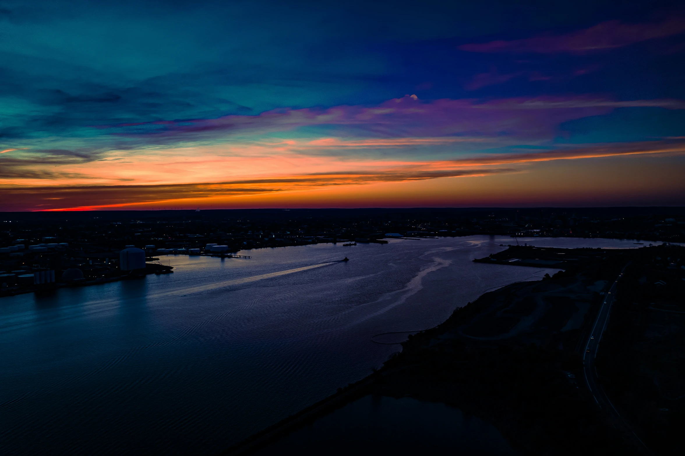 a very long body of water next to the city