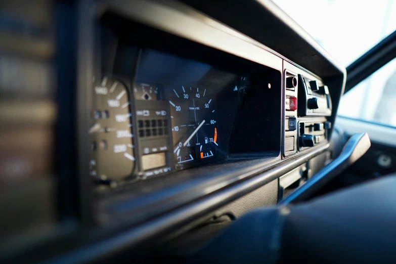 an older model truck dashboard shows it has been modified