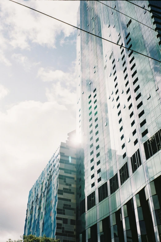 a group of tall buildings towering up into the sky