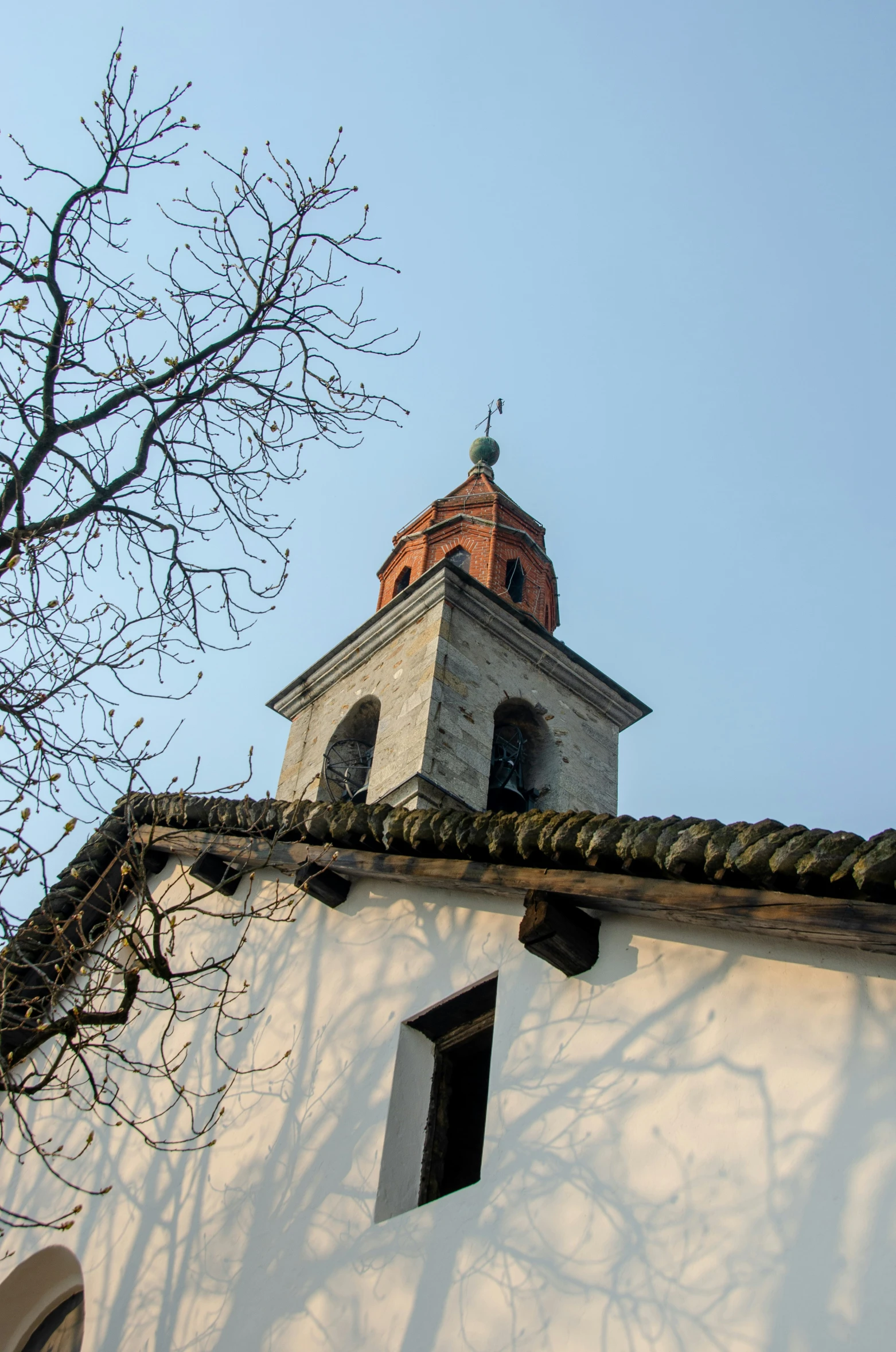 a large white building with a clock on top