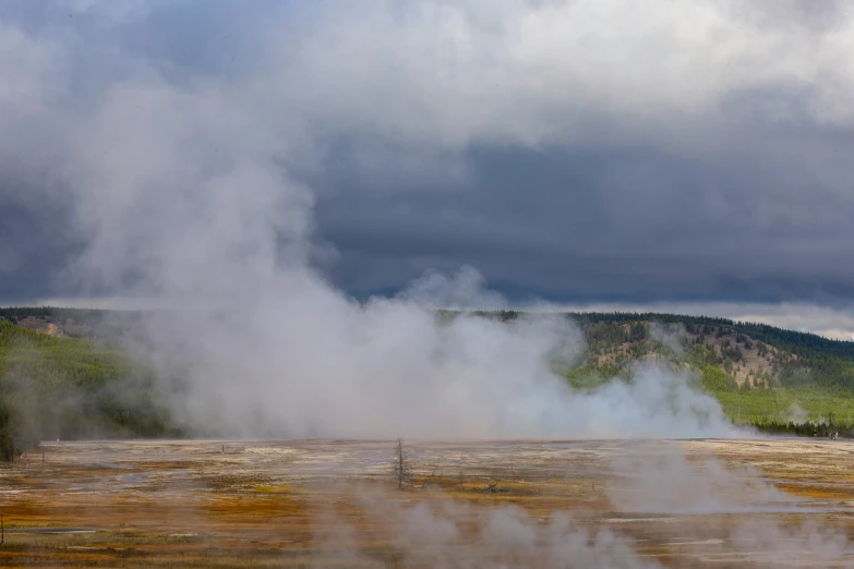 a steamy  springs on the side of a road