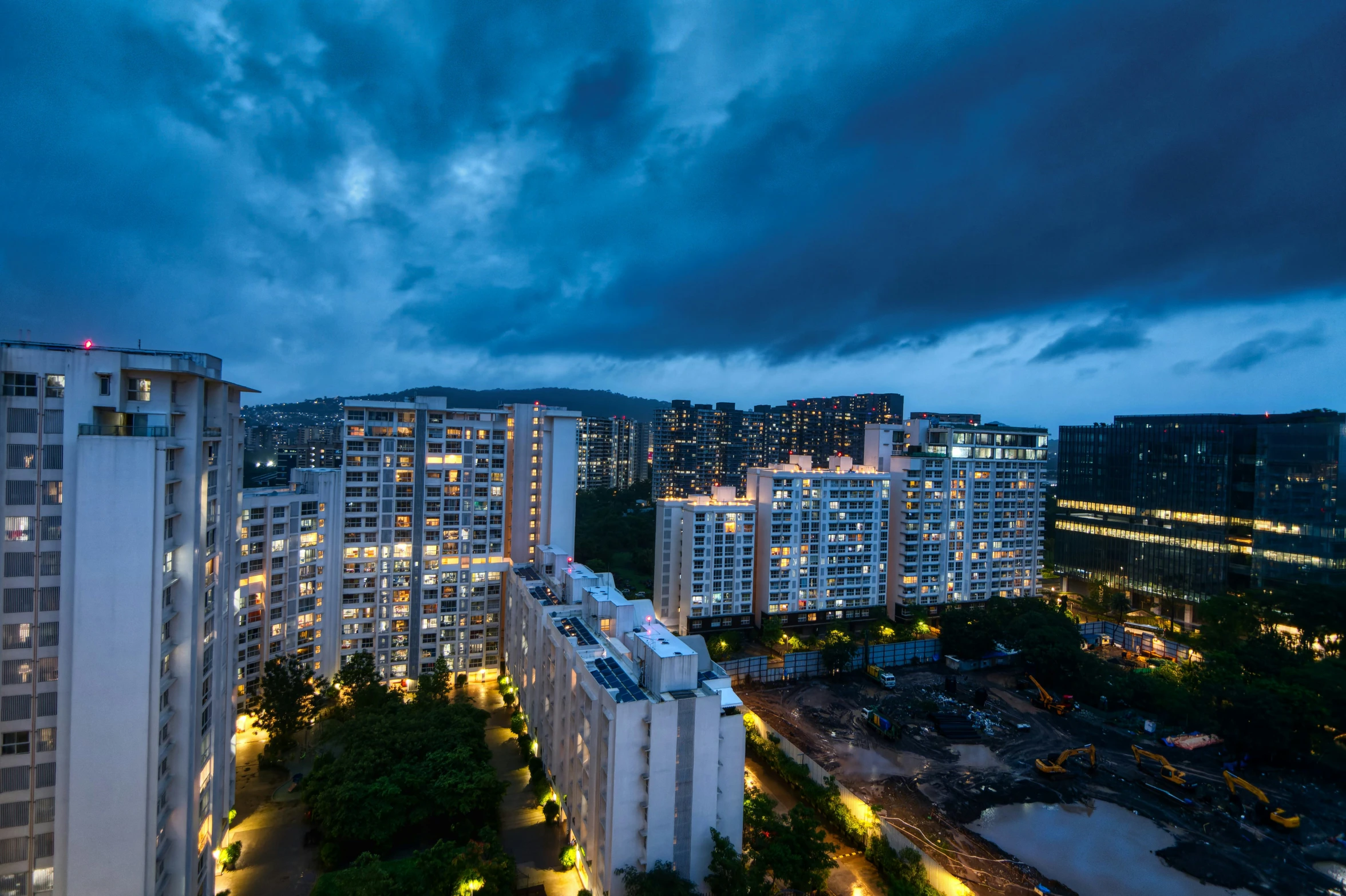 the city view from a rooftop at night