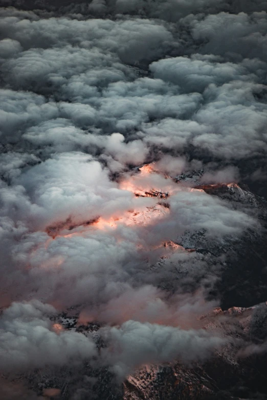 the sky is full of clouds, and they look like they are in the middle of a sunset