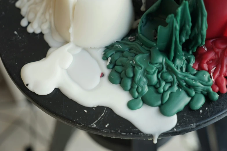 a table with white and red cakes on it