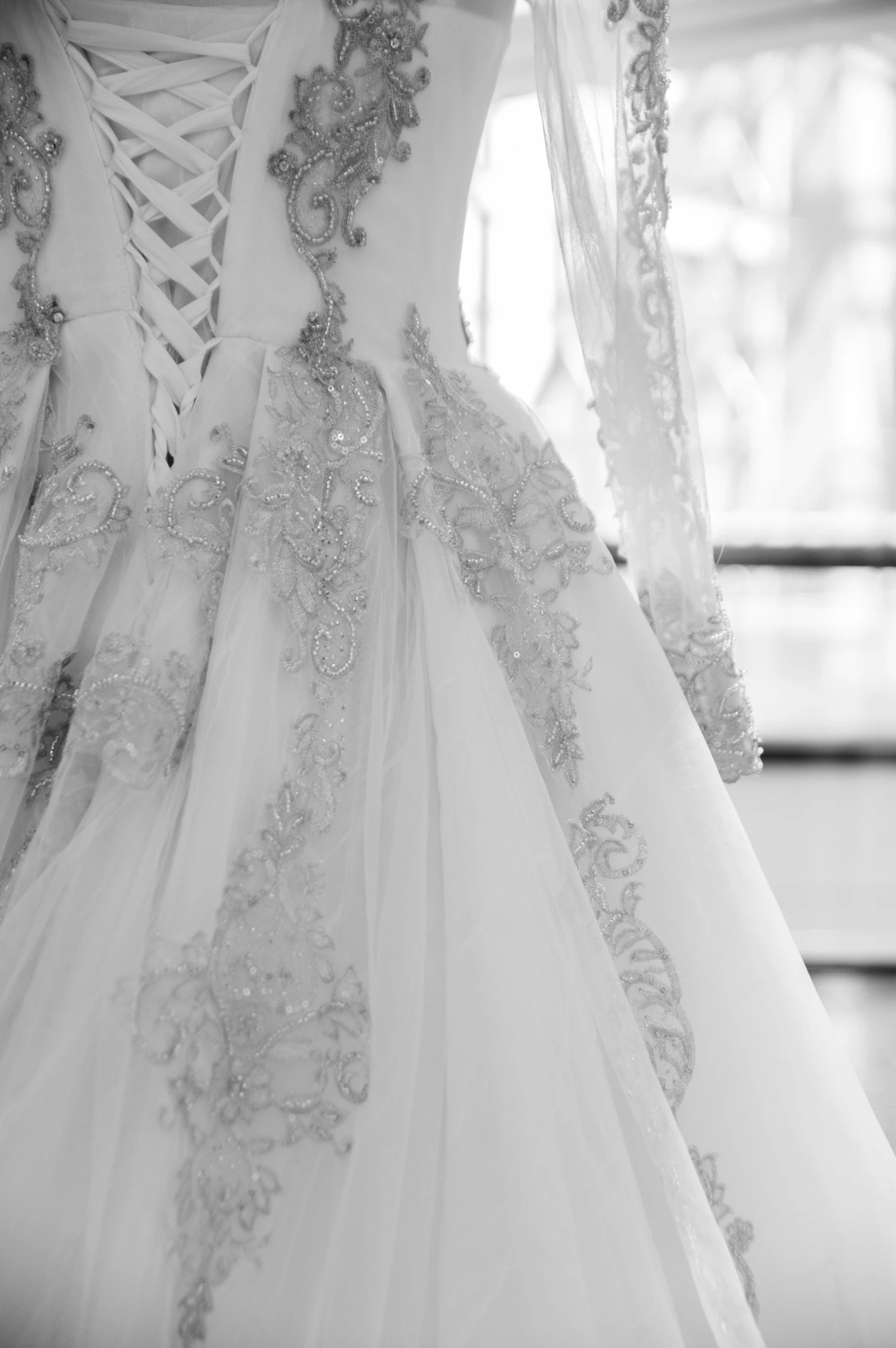 the back of a wedding gown on display