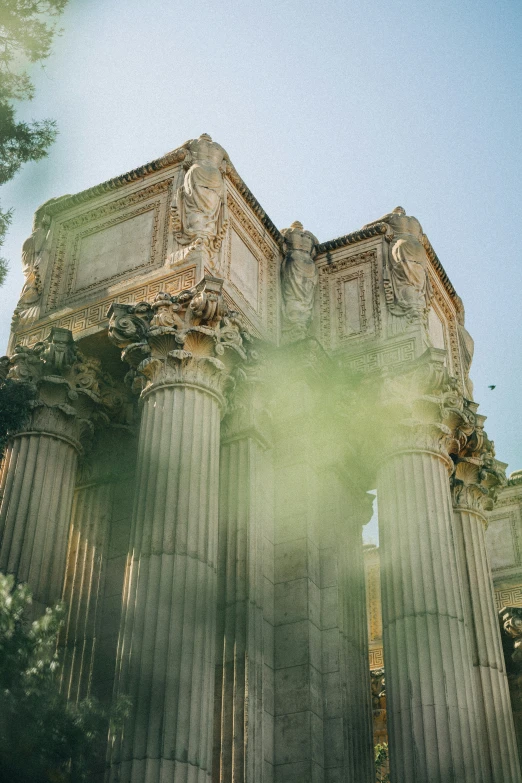 a tall building with columns in the background