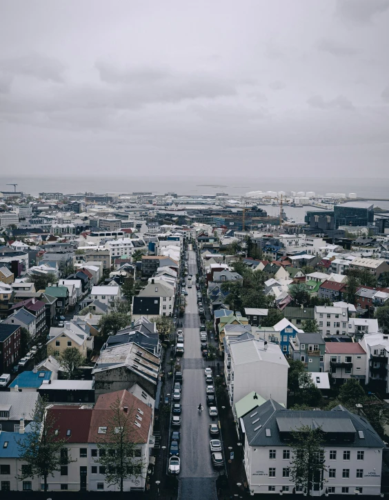 a street and several parked cars in a city