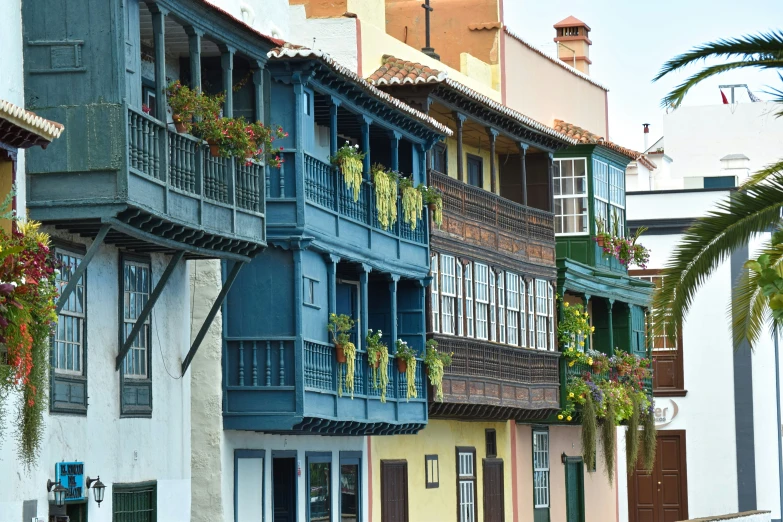 many colorful buildings are on the side of the street