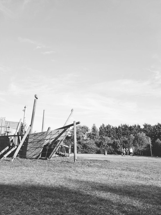 a black and white po of a kite flying